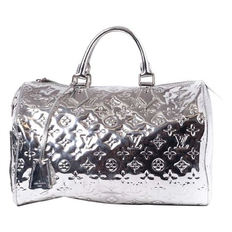 louis vuitton woven bag|louis vuitton silver bag.